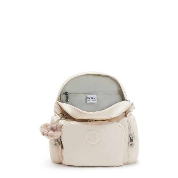 حقيبة ظهر صغيرة KIPLING مع أحزمة قابلة للتعديل أنثى بيج بيرل سيتي الرمز البريدي البسيطة